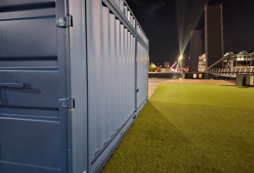 Durable 20ft container at night, weatherproof and secure Durable 20ft container at night, weatherproof and secure – ideal for storage, business use, or modified container homes in New Zealand.